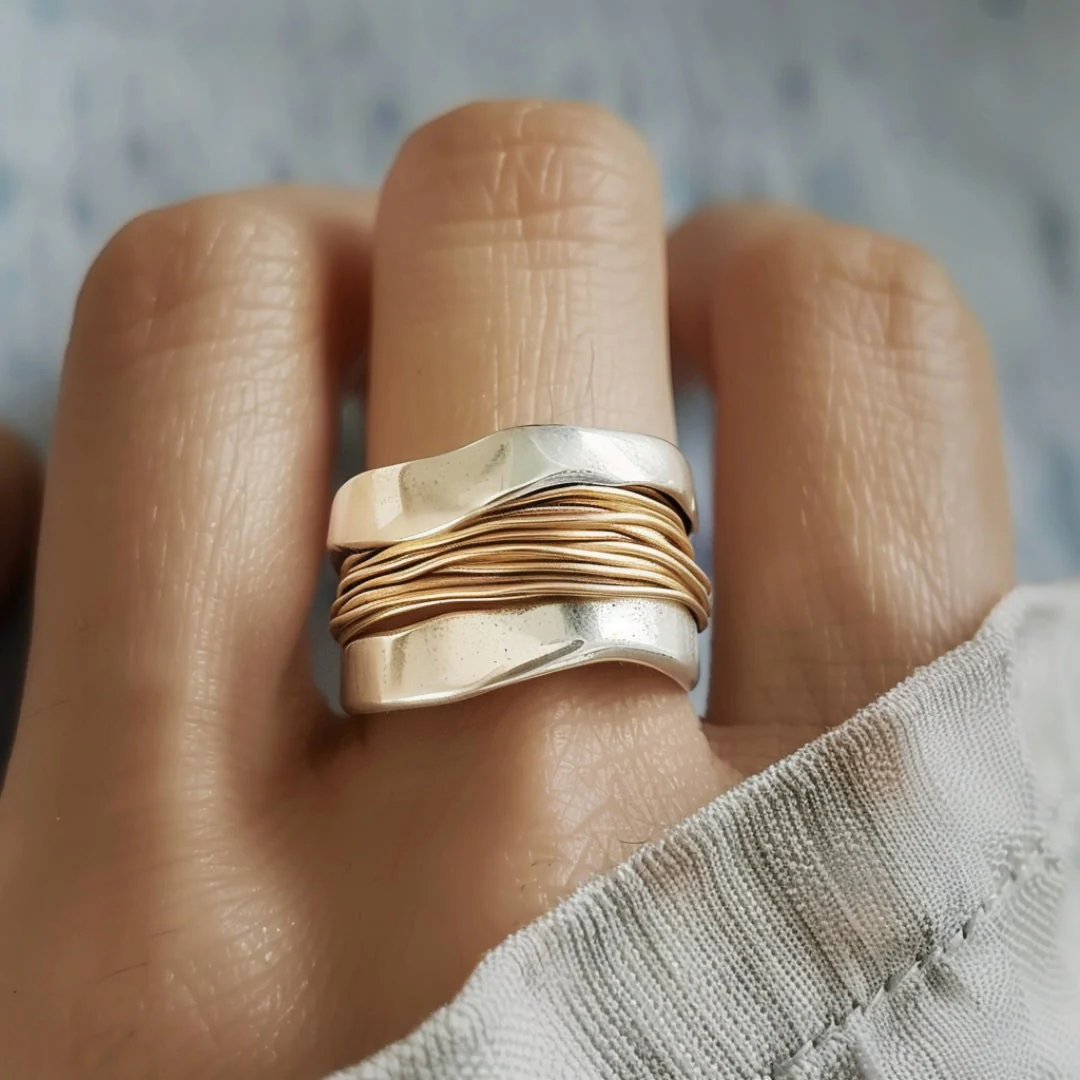 Elegant Silver Ring with Gold Threads